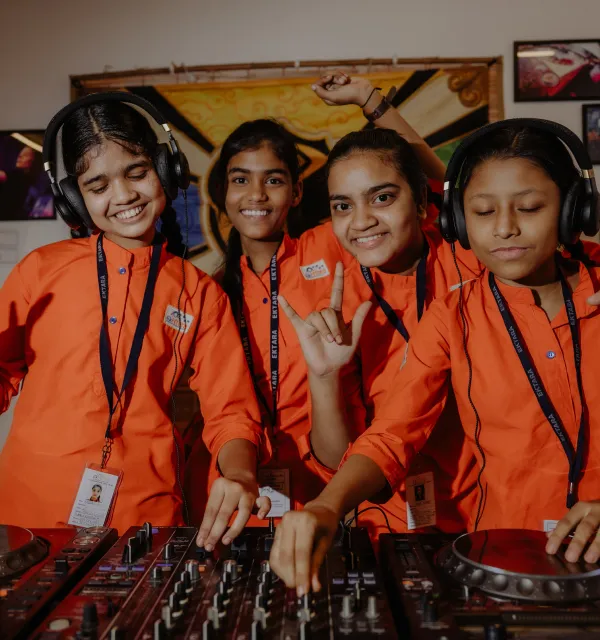 Tomorrowland Foundation - Kids playing DJ